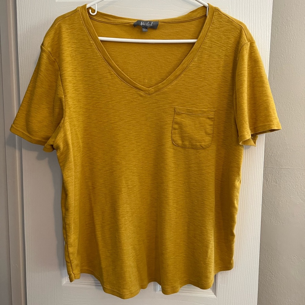 Mustard yellow v-neck short sleeve shirt with pockets